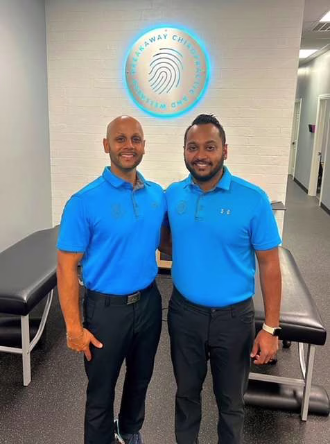 Dr. Rakesh Lad and Dr. Hasheen Lad at Breakaway Chiropractic & Wellness in Frisco, Texas
