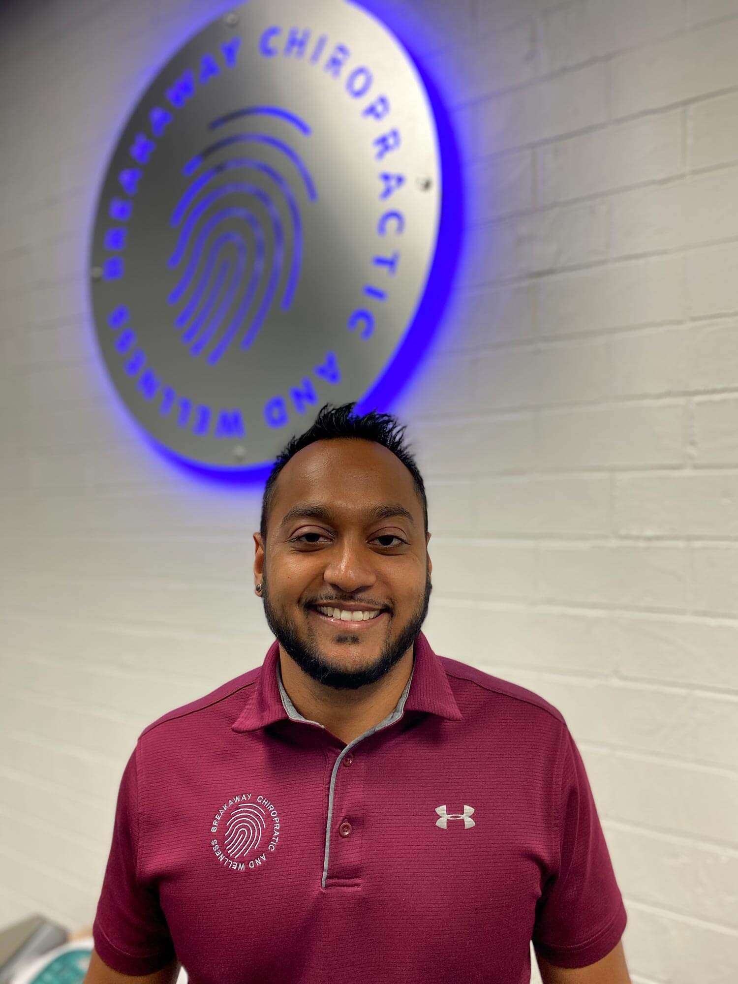 Dr. Hasheen Lad, D.C., chiropractor at Breakaway Chiropractic & Wellness in Frisco, TX