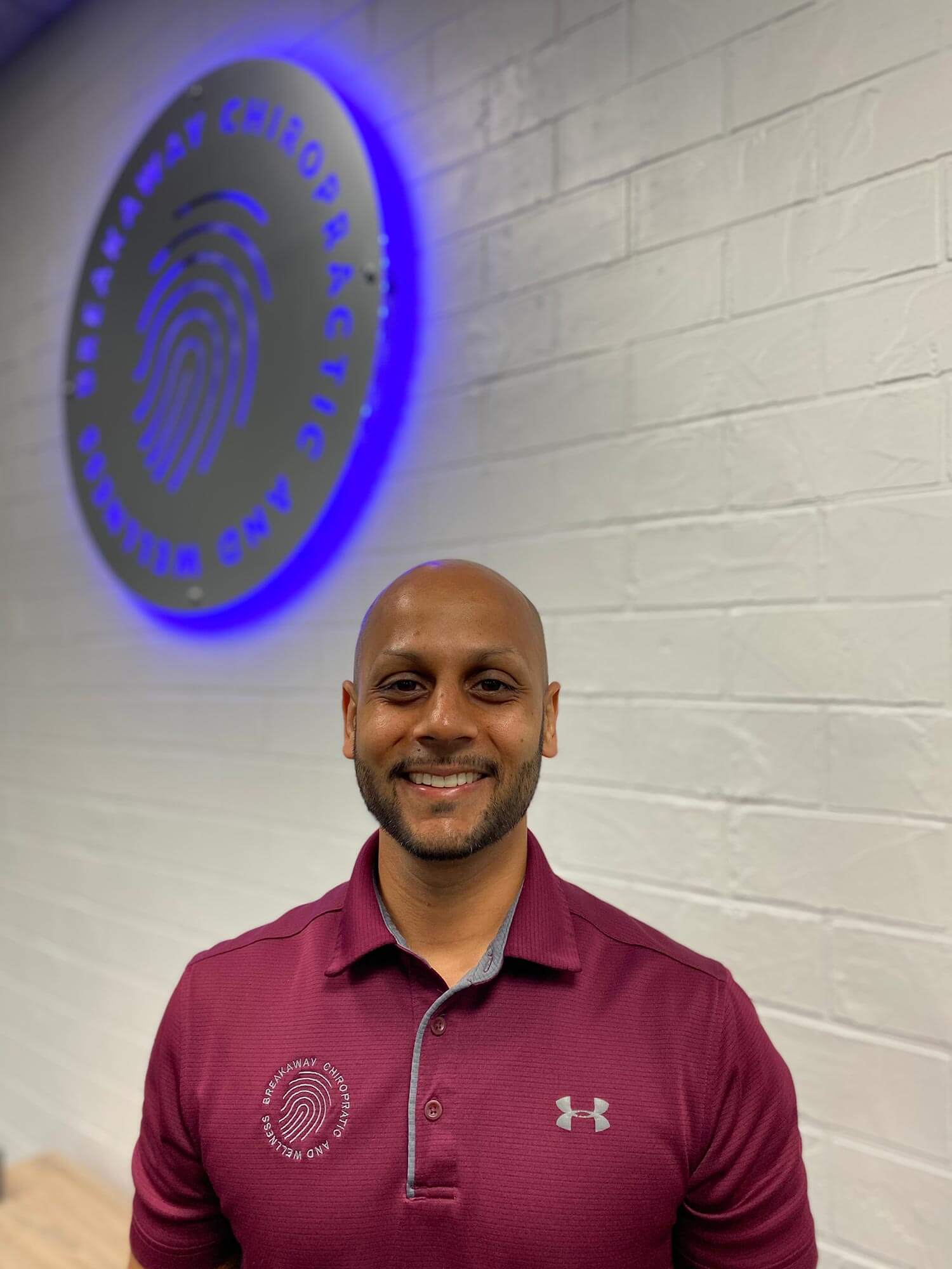 Dr. Rakesh Lad, D.C., founder of Breakaway Chiropractic & Wellness in Frisco, TX